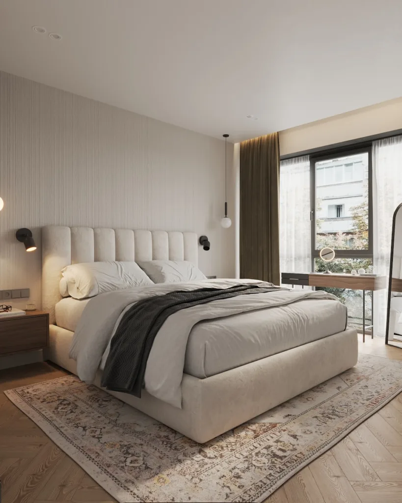 Chambre avec un lit large et une large fenêtre